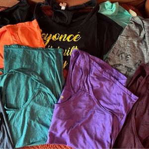 Bundle of 17 women’s workout tops size M/L